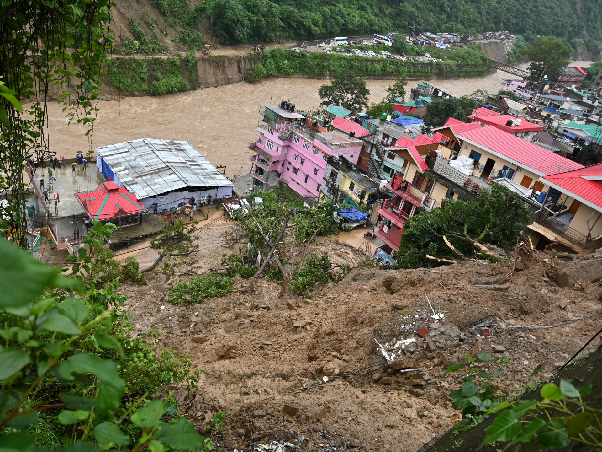 Dozens dead as floods, landslides hit India’s Himalayan region